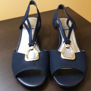 Impo stretch navy sandals with silver accents.